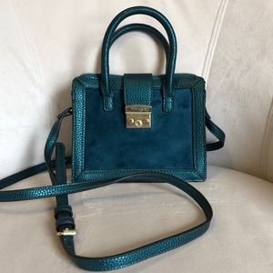 Green cross body bag by “A New Day”